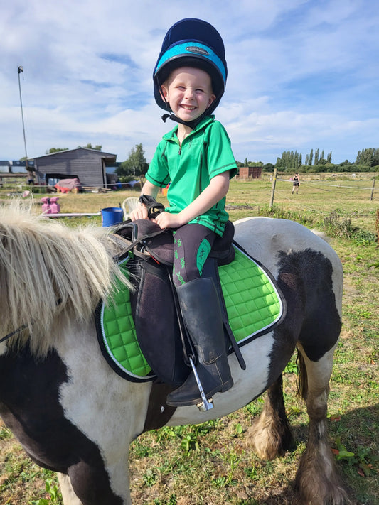 Childrens green shorts sleeved baselayer DNA equestrian ltd